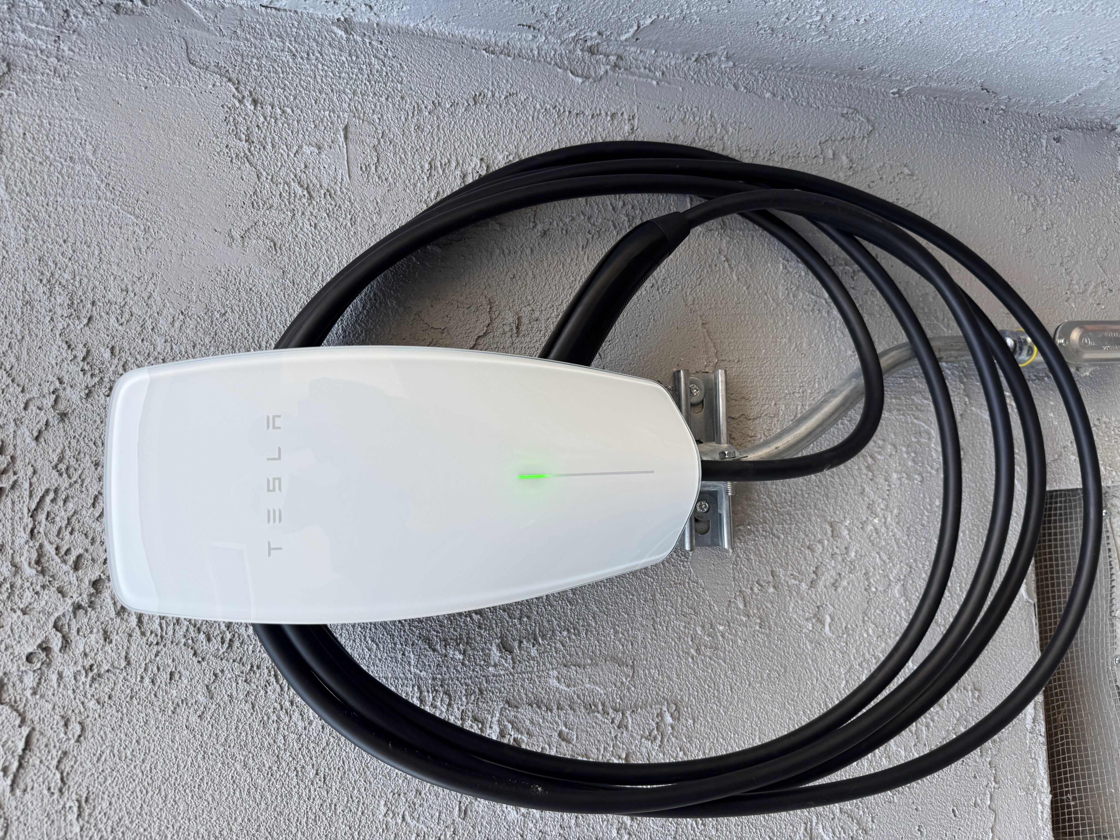 Completed Tesla Wall Connector installation — Huntington Park, CA. 200A panel upgrade, dedicated 50A circuit.